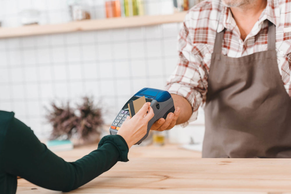 A customer paying with a card