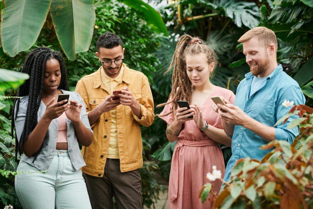 group of young people with phones