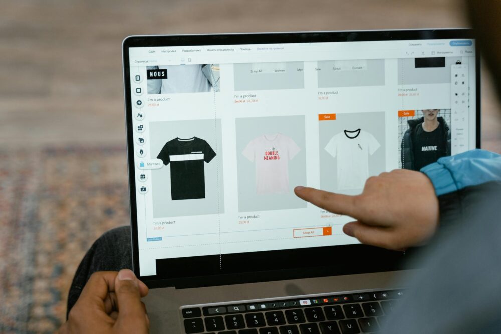 People looking at clothes in an online store