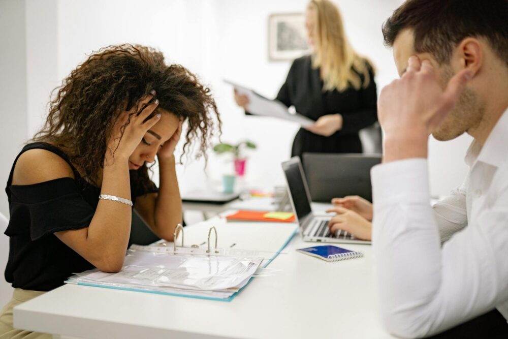 Stressed people at an office job