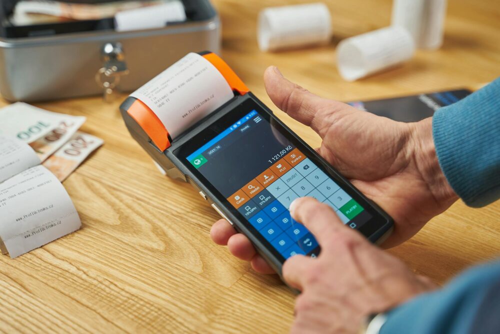 A merchant printing a receipt